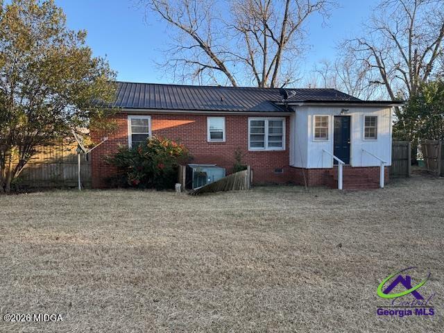 151 Edmondson Circle Cochran, GA 31014 - Photo 14 of 16 front view of a house with a yard