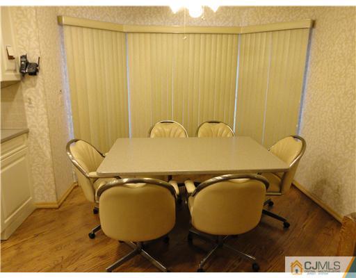 22 Innes Road East Brunswick, NJ 08816 - Photo 5 of 18 a view of balcony with table and chair