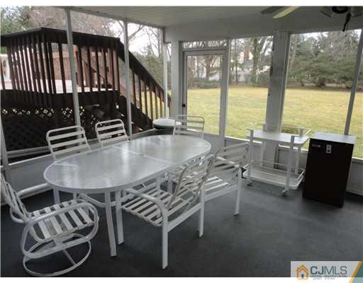 22 Innes Road East Brunswick, NJ 08816 - Photo 8 of 18 a dining room with furniture window and outside view