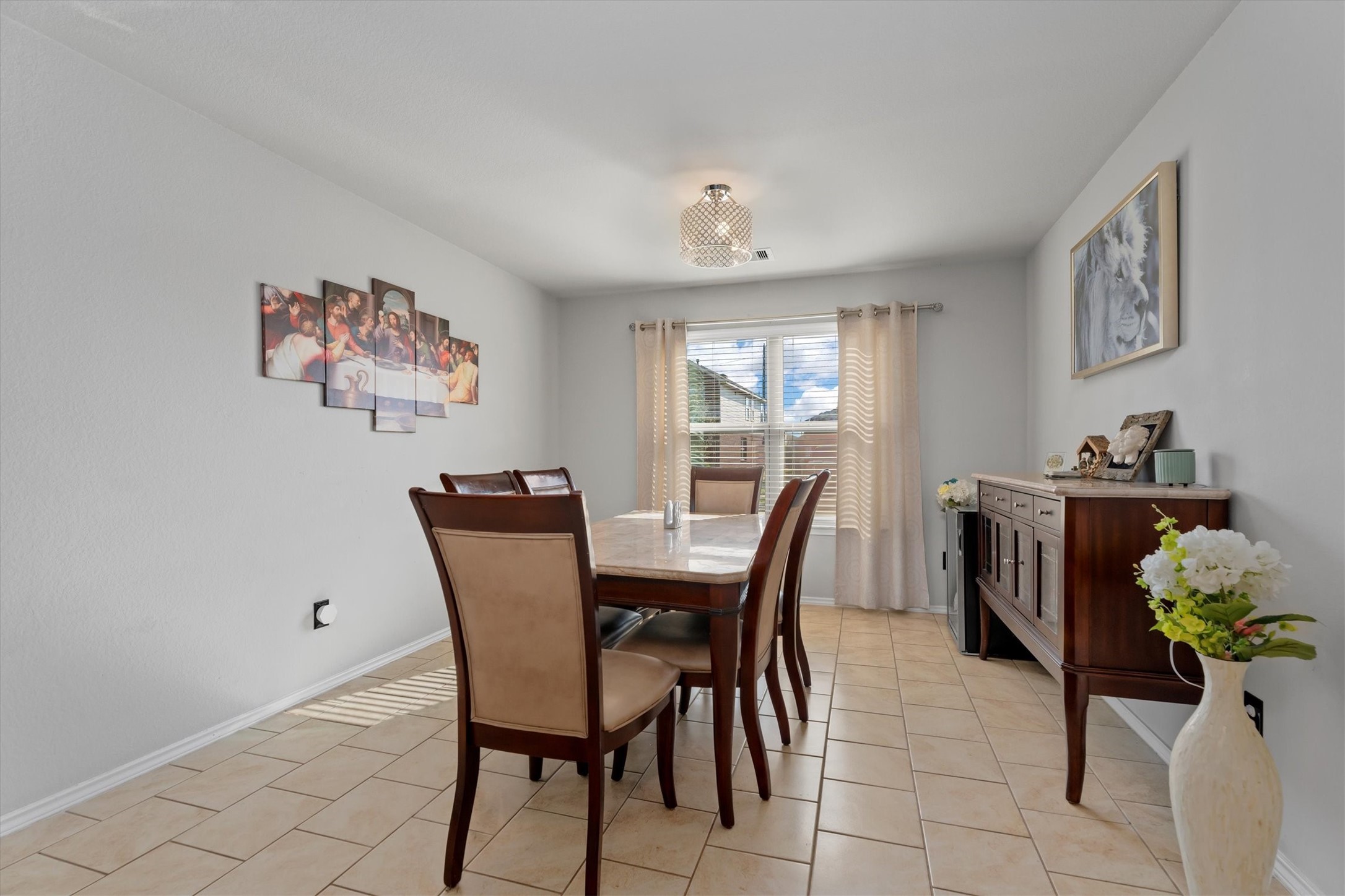 2602 Lincolns Meadow Drive Spring, TX 77373 - Photo 15 of 39 a view of a dining room with furniture and a potted plant