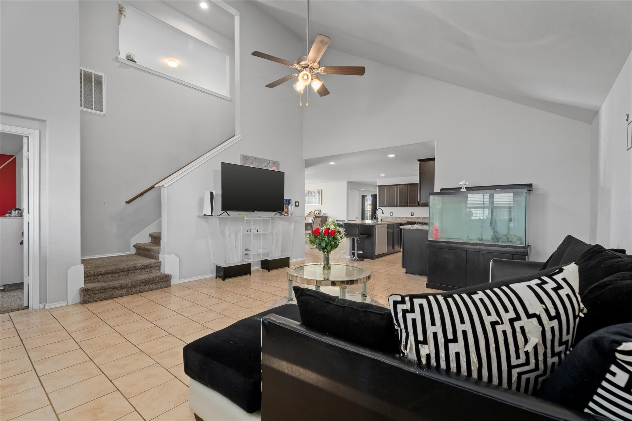 2602 Lincolns Meadow Drive Spring, TX 77373 - Photo 16 of 39 a living room with furniture and a flat screen tv