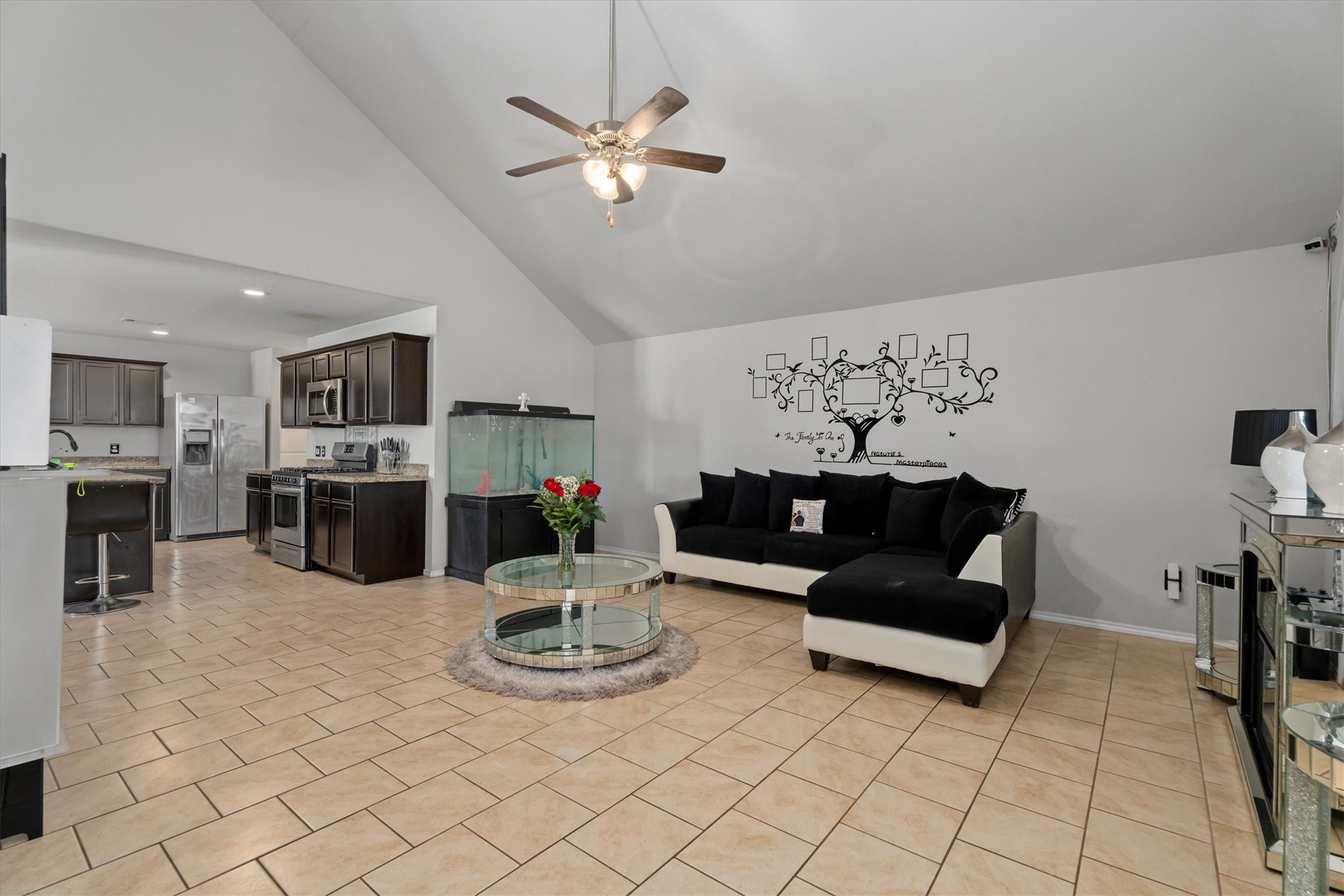 2602 Lincolns Meadow Drive Spring, TX 77373 - Photo 17 of 39 a living room with furniture and kitchen view