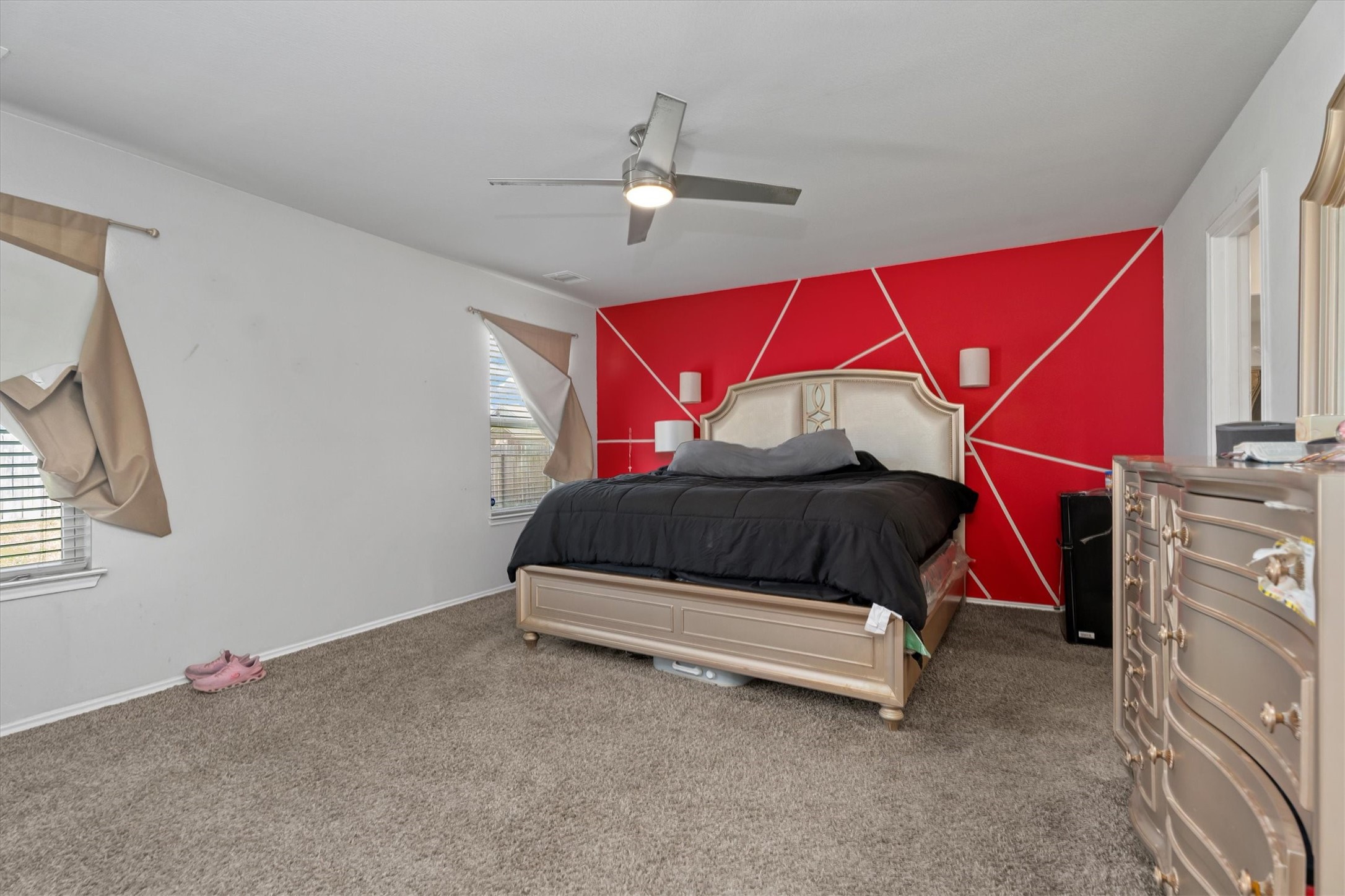 2602 Lincolns Meadow Drive Spring, TX 77373 - Photo 20 of 39 a bedroom with a bed and a mirror