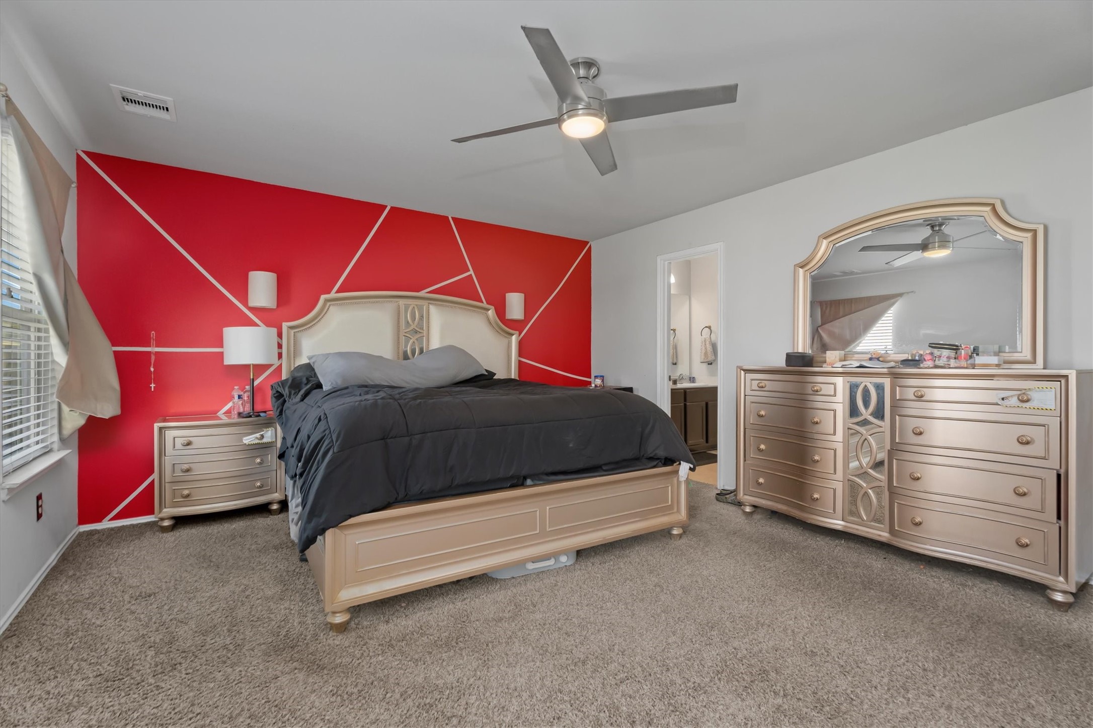 2602 Lincolns Meadow Drive Spring, TX 77373 - Photo 21 of 39 a bedroom with a bed and dresser