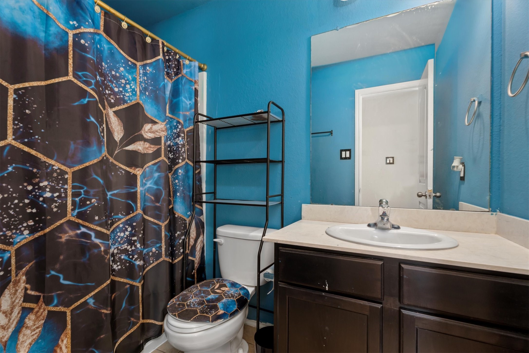 2602 Lincolns Meadow Drive Spring, TX 77373 - Photo 25 of 39 a bathroom with a sink a toilet and shower