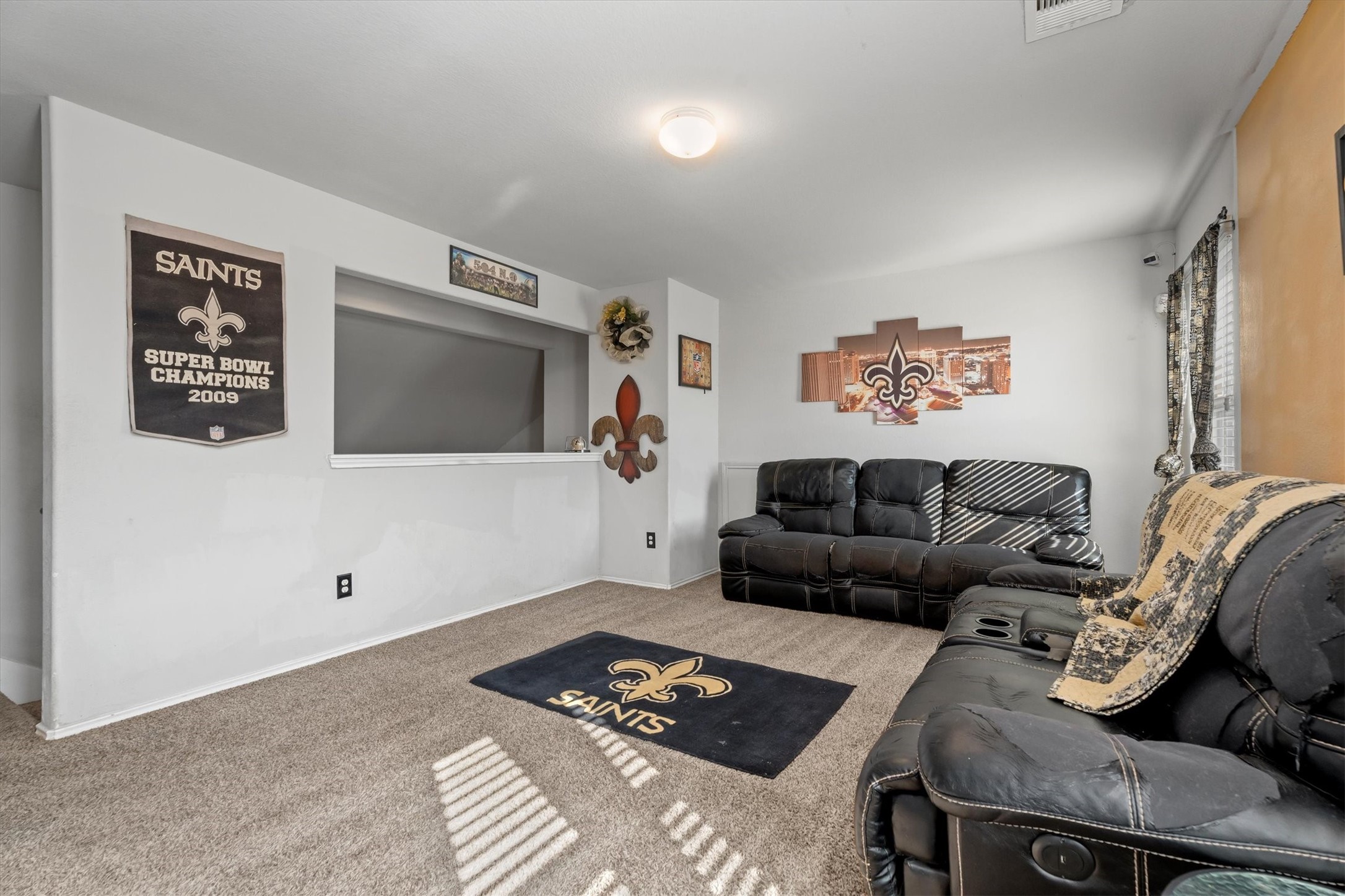 2602 Lincolns Meadow Drive Spring, TX 77373 - Photo 30 of 39 a living room with furniture and a flat screen tv