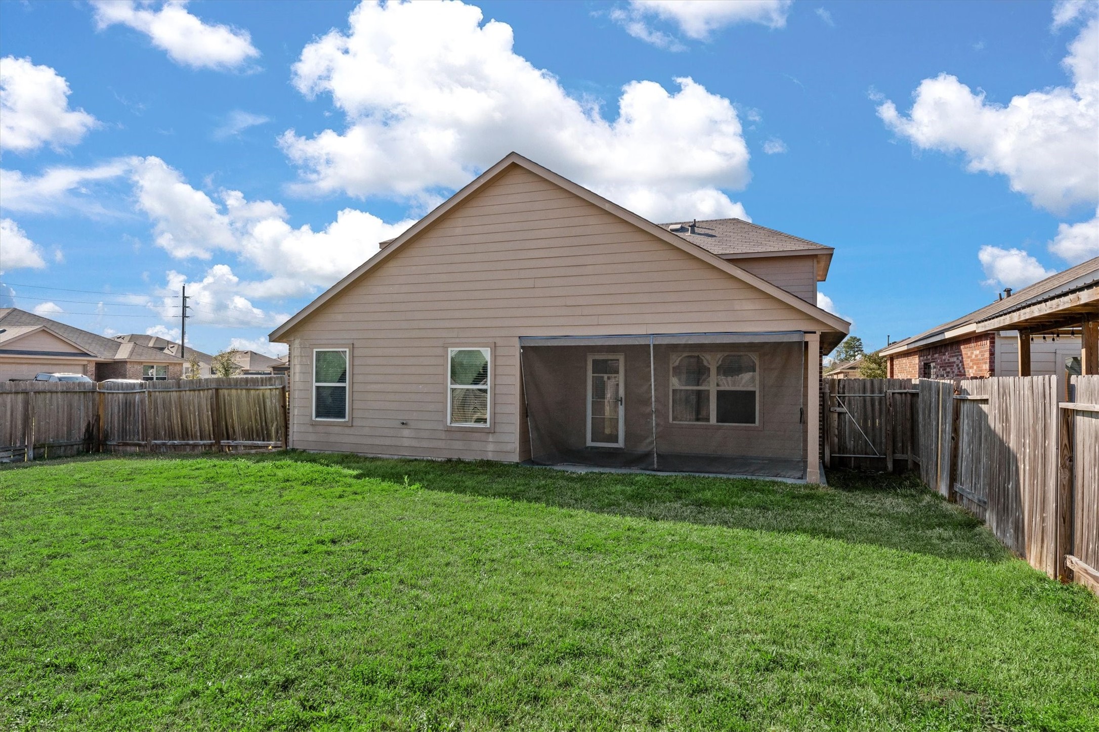 2602 Lincolns Meadow Drive Spring, TX 77373 - Photo 37 of 39 a view of a house with a yard