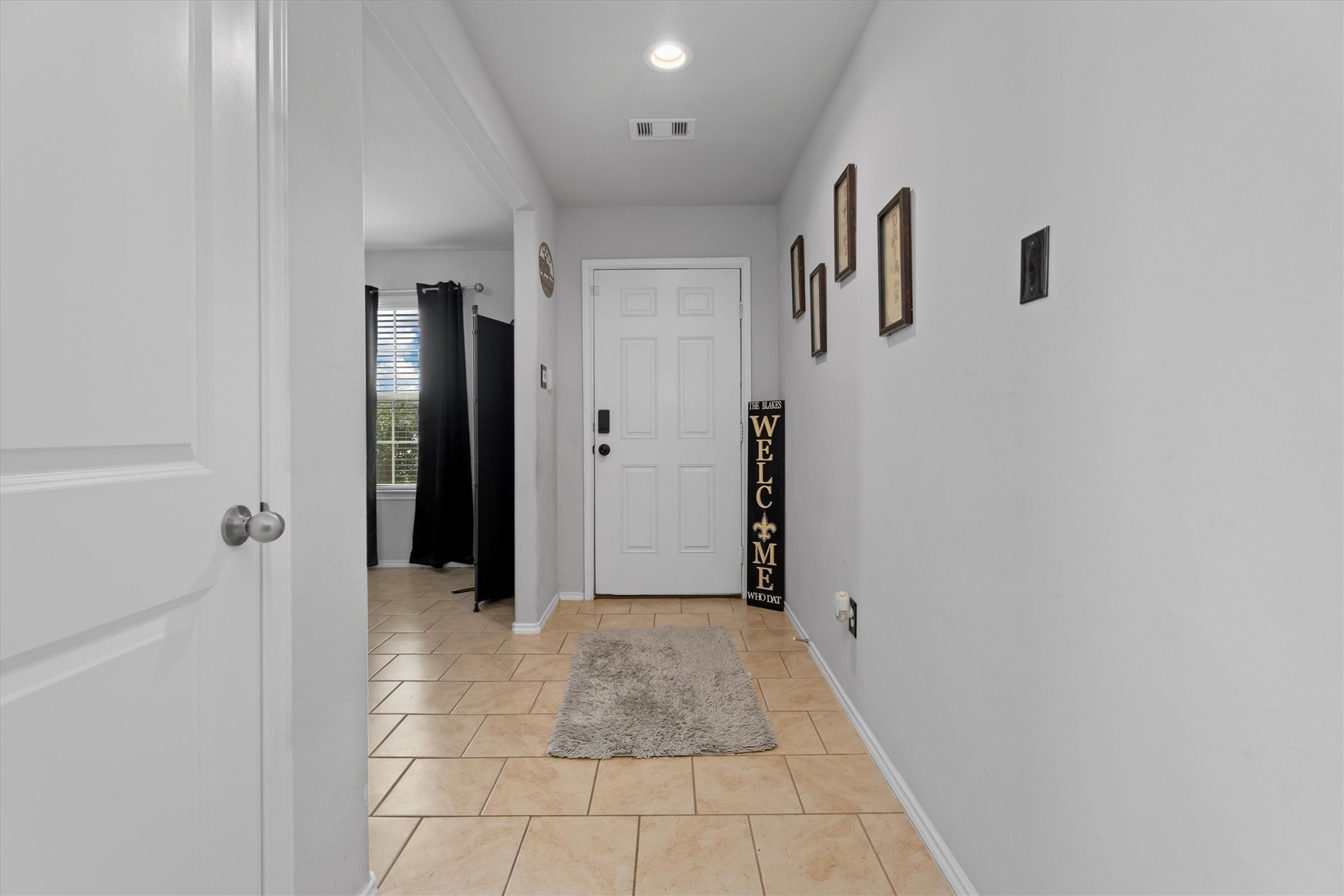 2602 Lincolns Meadow Drive Spring, TX 77373 - Photo 6 of 39 a view of a hallway with wooden floor