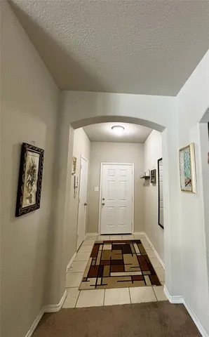 a bathroom with a tub and shower