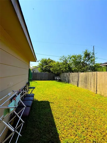 a view of a garden and basketball court