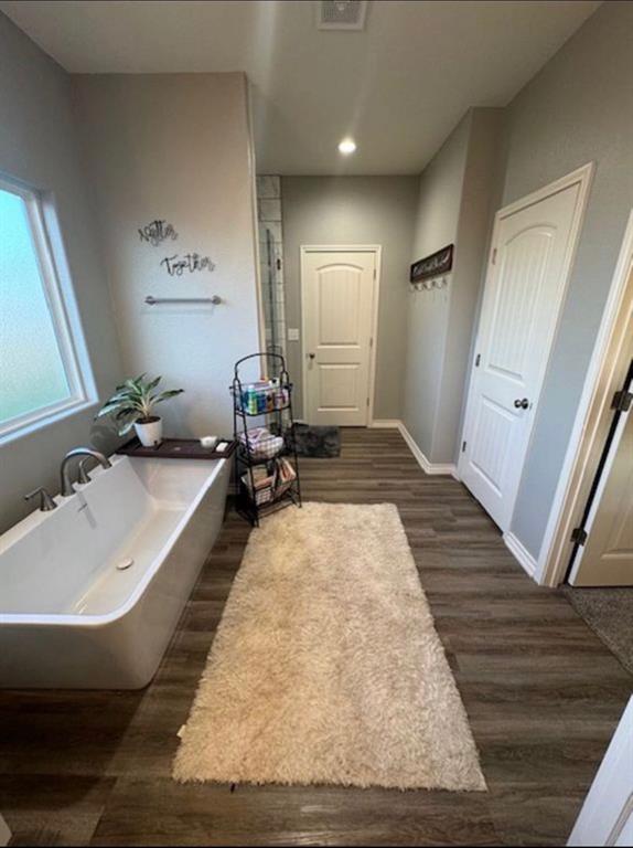 306 Embraer Road Abilene, TX 79602 - Photo 11 of 19 a bathroom with sink and mirror
