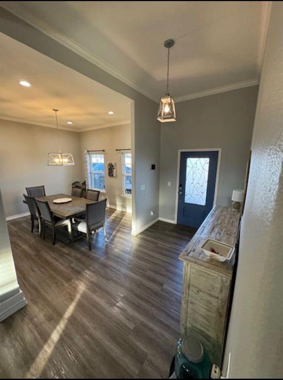 306 Embraer Road Abilene, TX 79602 - Photo 8 of 19 a living room with furniture and a chandelier