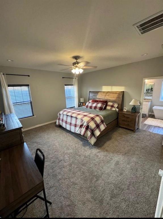306 Embraer Road Abilene, TX 79602 - Photo 9 of 19 a bedroom with bed couch and window