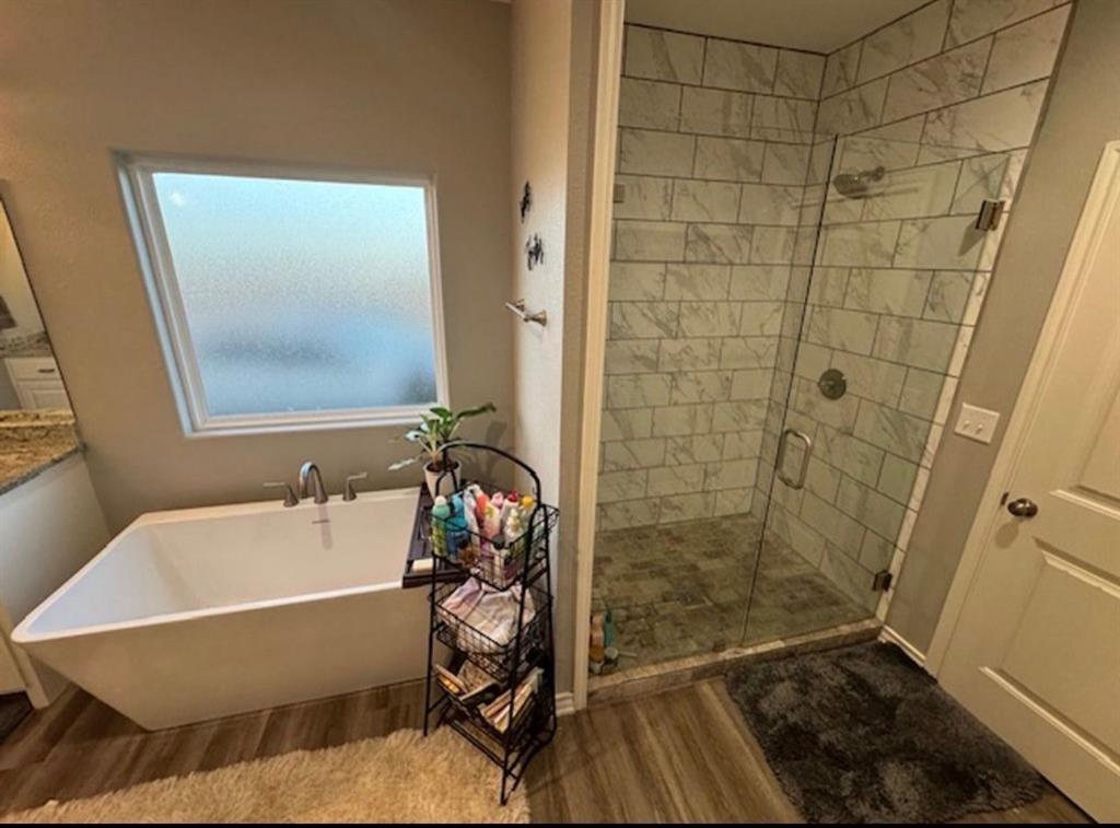 306 Embraer Road Abilene, TX 79602 - Photo 10 of 19 a bathroom with a sink and a shower