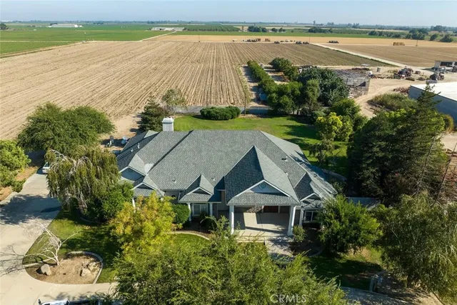 an aerial view of a house with a outdoor space