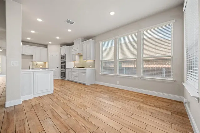 a large kitchen with a lot of counter space