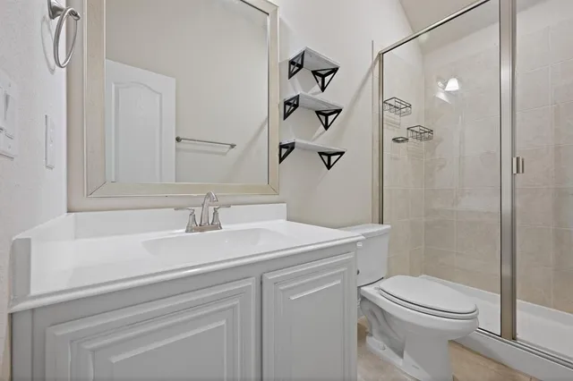 a view of a balcony with wooden floor