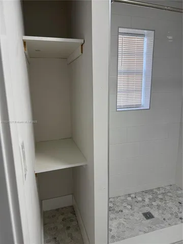 a view of storage and utility room