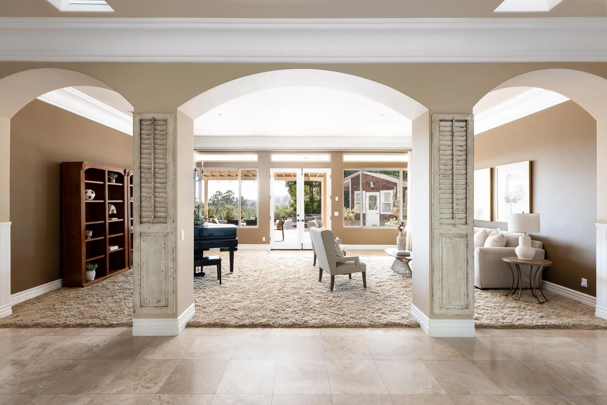 15435 Eastvale Road Poway, CA 92064 - Photo 1 of 57 a living room with furniture and large windows