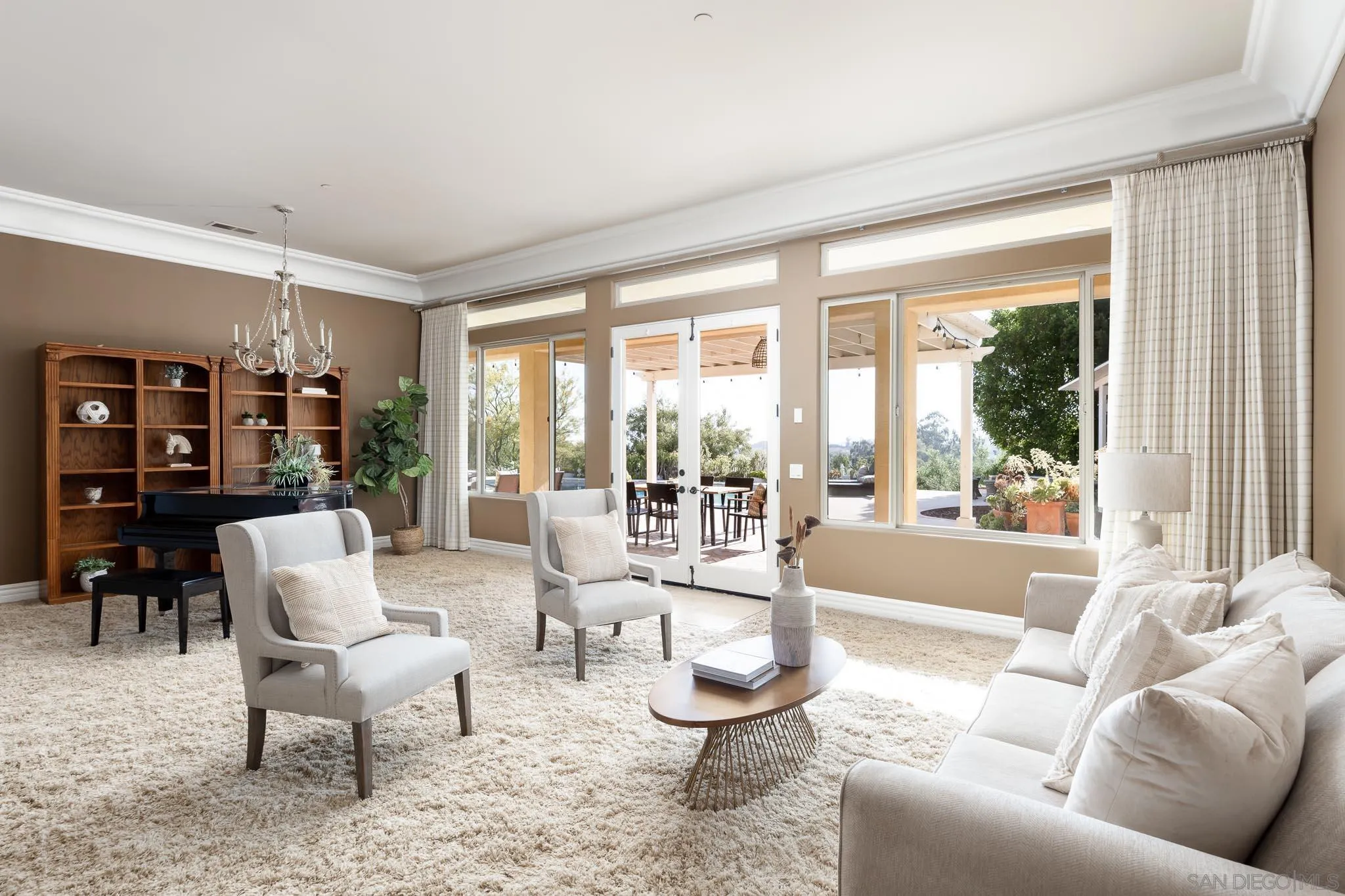 15435 Eastvale Road Poway, CA 92064 - Photo 12 of 57 a living room with furniture and a large window