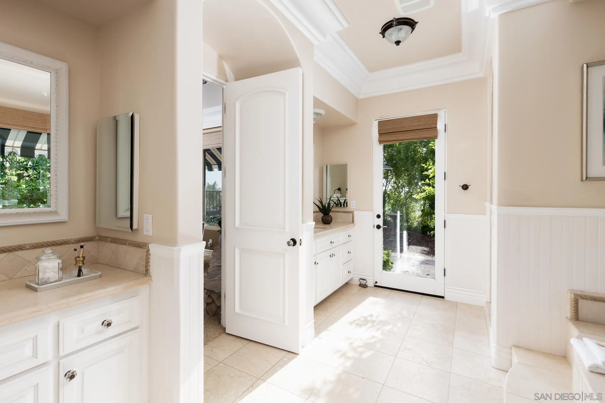 15435 Eastvale Road Poway, CA 92064 - Photo 16 of 57 a bathroom with a tub sink and mirror