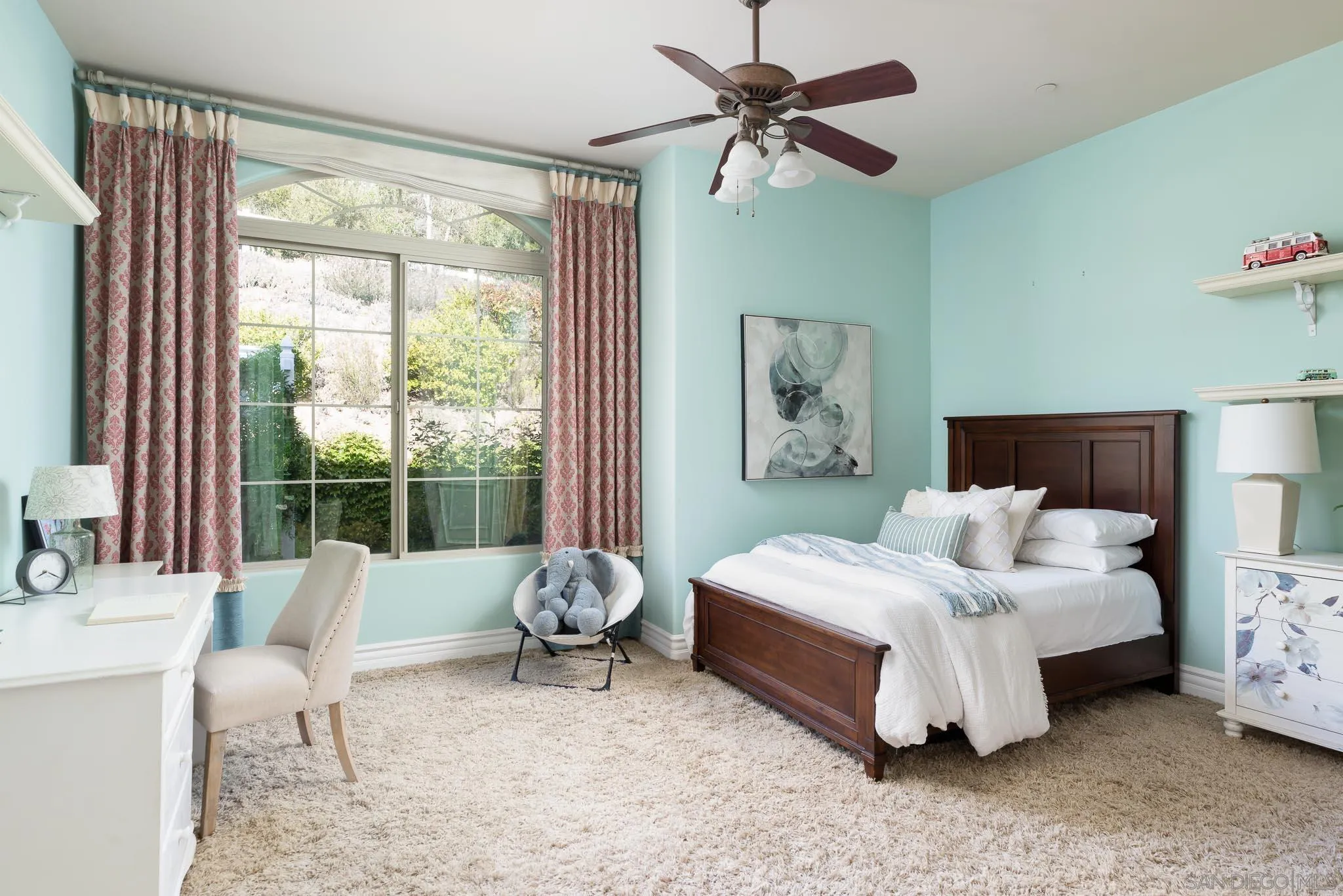 15435 Eastvale Road Poway, CA 92064 - Photo 18 of 57 a bedroom with a bed and a window