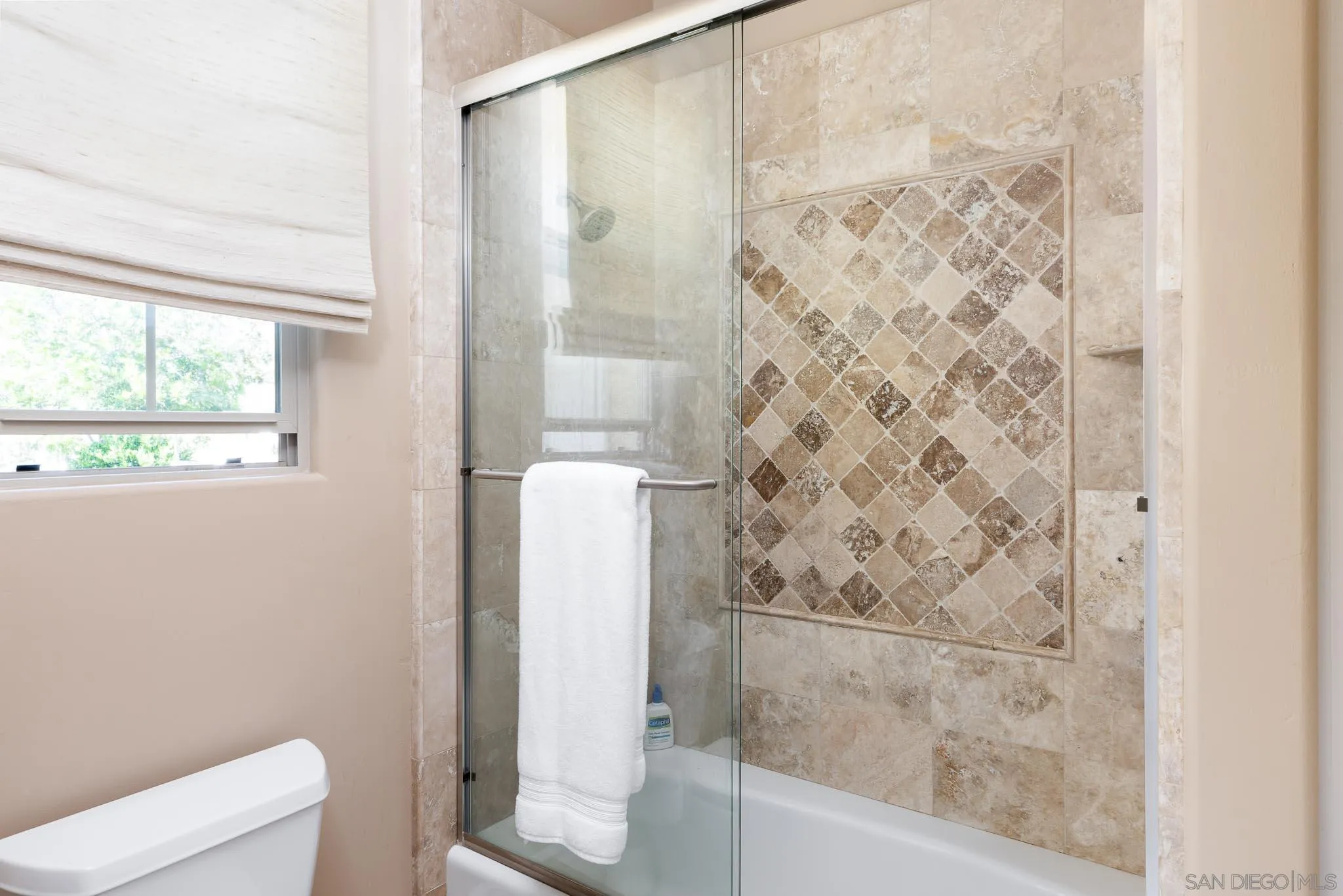 15435 Eastvale Road Poway, CA 92064 - Photo 20 of 57 a bathroom with a shower and a toilet