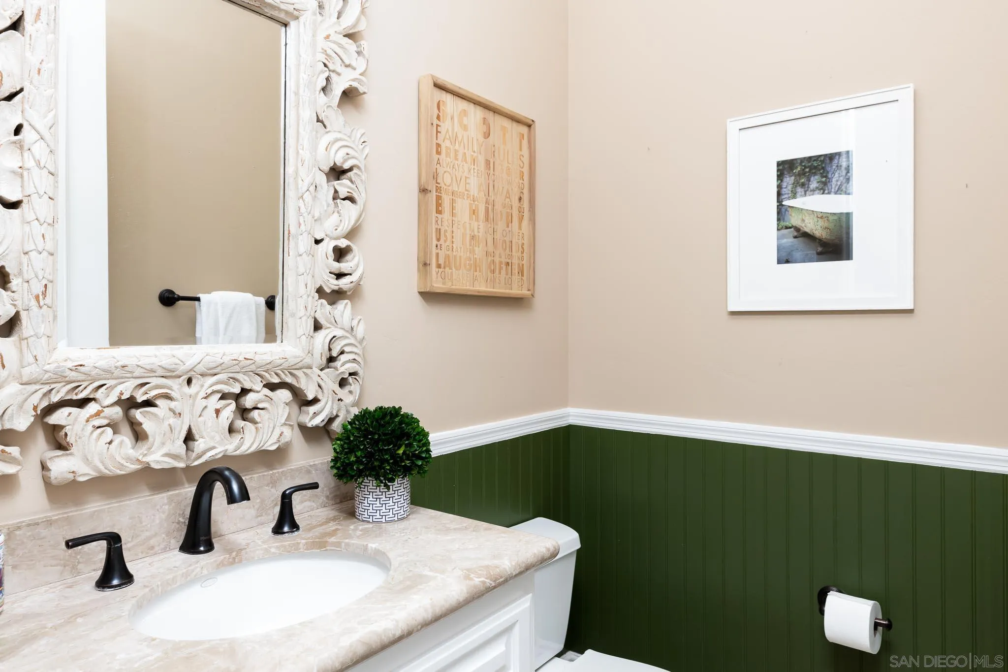 15435 Eastvale Road Poway, CA 92064 - Photo 26 of 57 a bathroom with a sink and a mirror