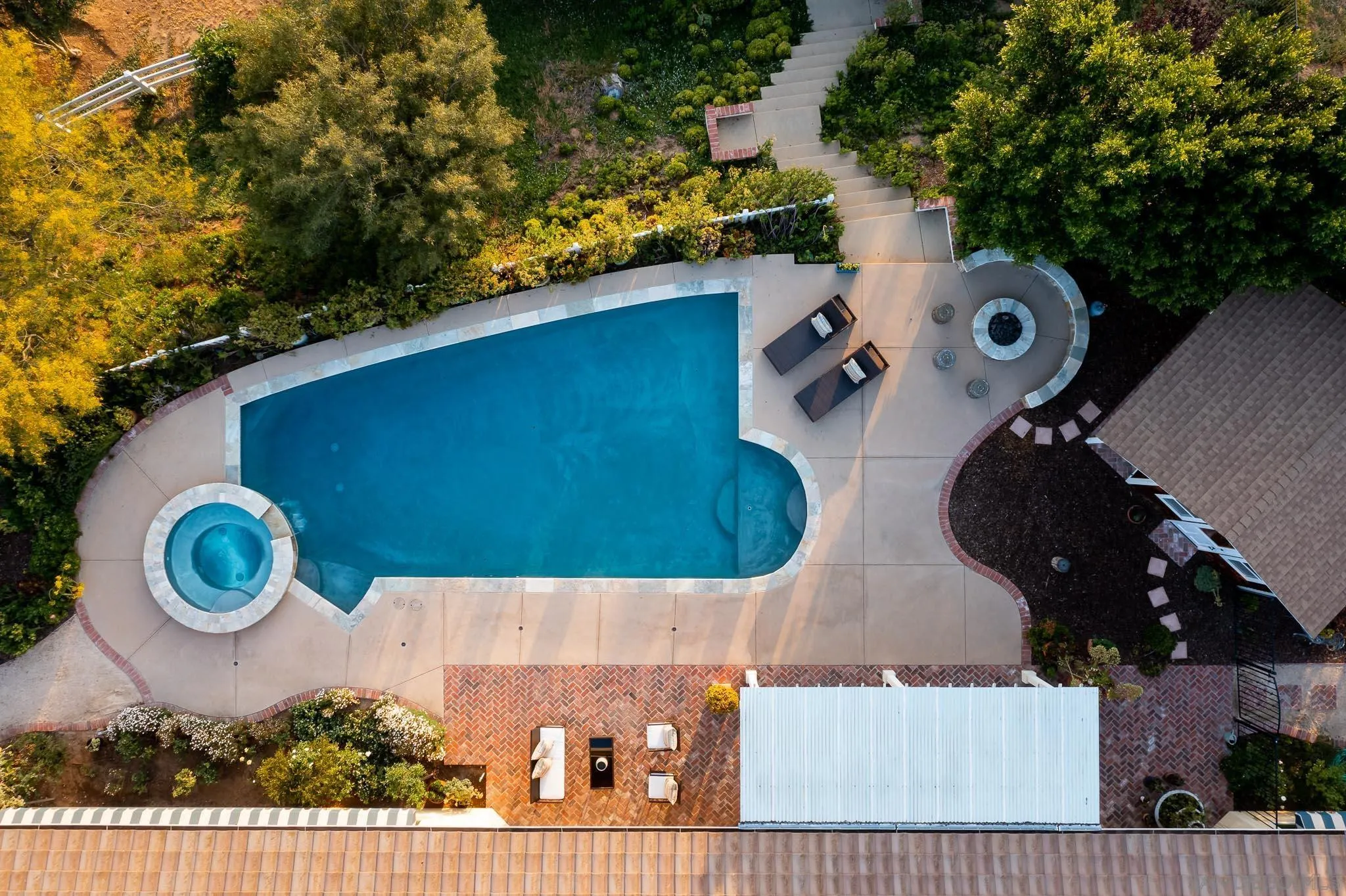 15435 Eastvale Road Poway, CA 92064 - Photo 30 of 57 an aerial view of a house with a yard and many windows