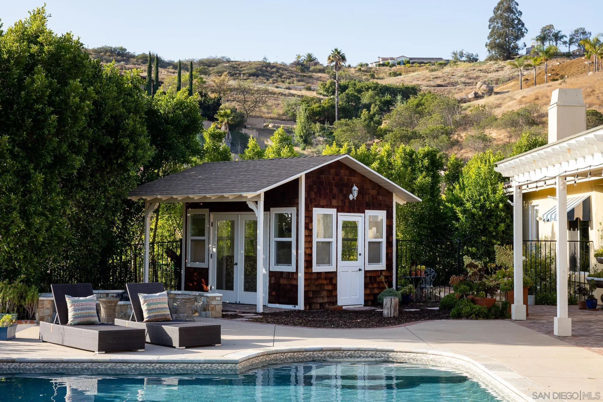 15435 Eastvale Road Poway, CA 92064 - Photo 38 of 57 a view of a house with a porch