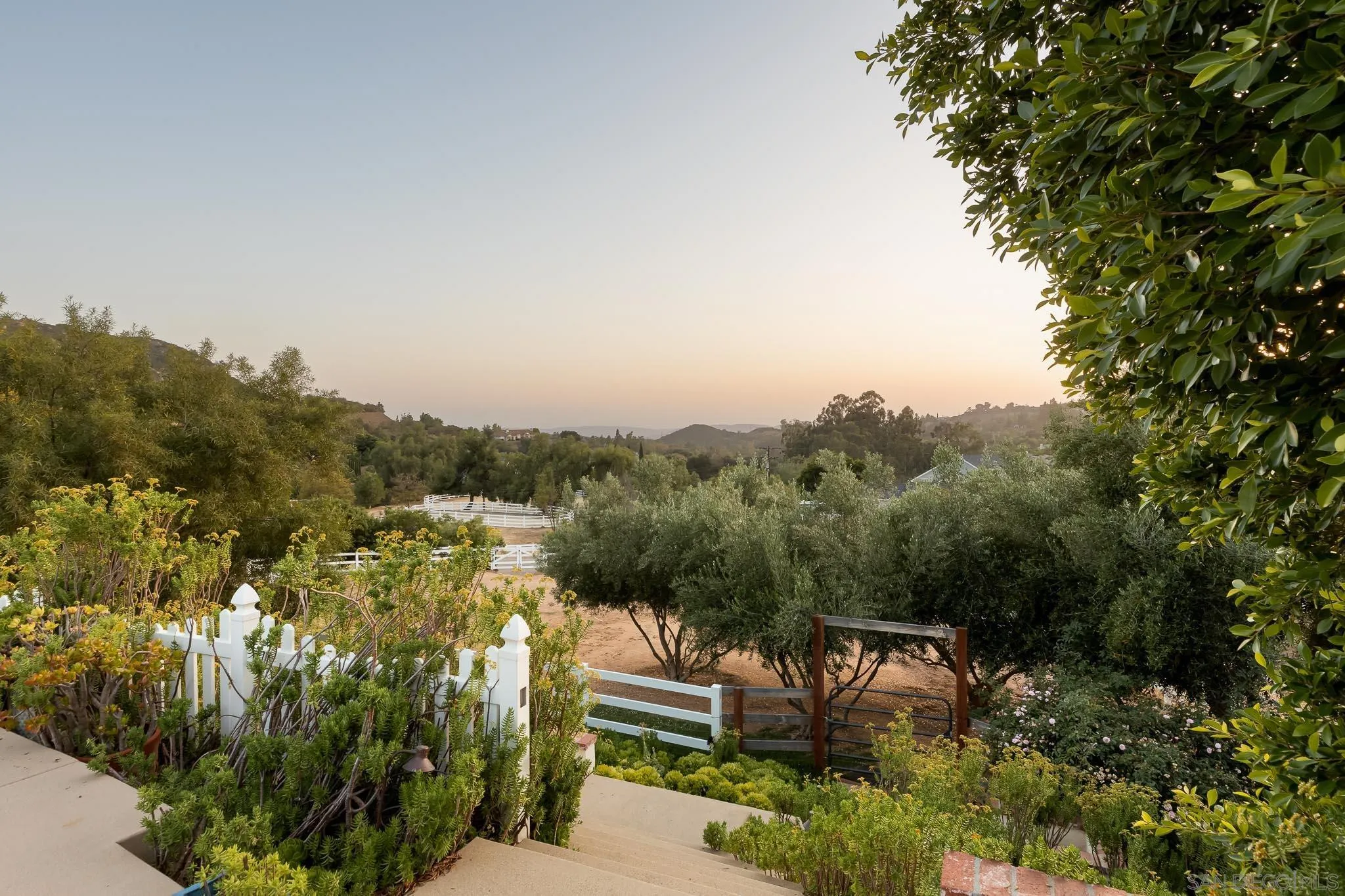 15435 Eastvale Road Poway, CA 92064 - Photo 48 of 57 a view of a city with lush green forest