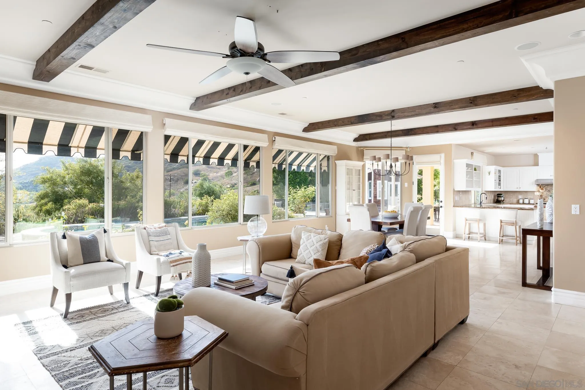 15435 Eastvale Road Poway, CA 92064 - Photo 10 of 57 a living room with furniture and a large window