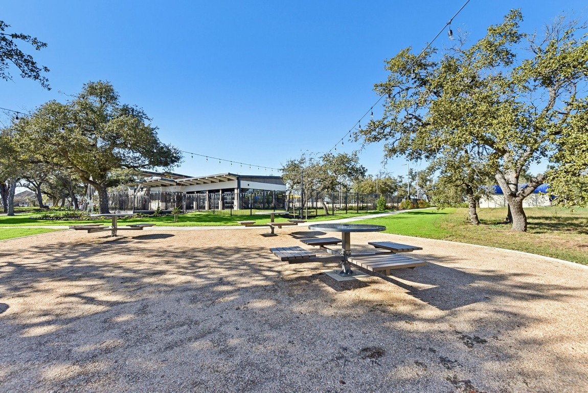 217 Firefox Way Jarrell, TX 76537 - Photo 5 of 5 a view of backyard with swimming pool and green space