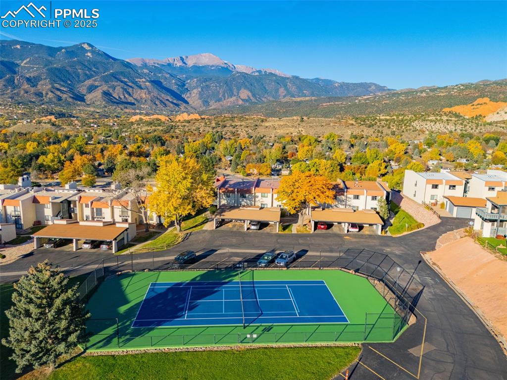1130 Fontmore Road, Unit D Colorado Springs, CO 80904 - Photo 32 of 33 an aerial view of residential houses with outdoor space and swimming pool