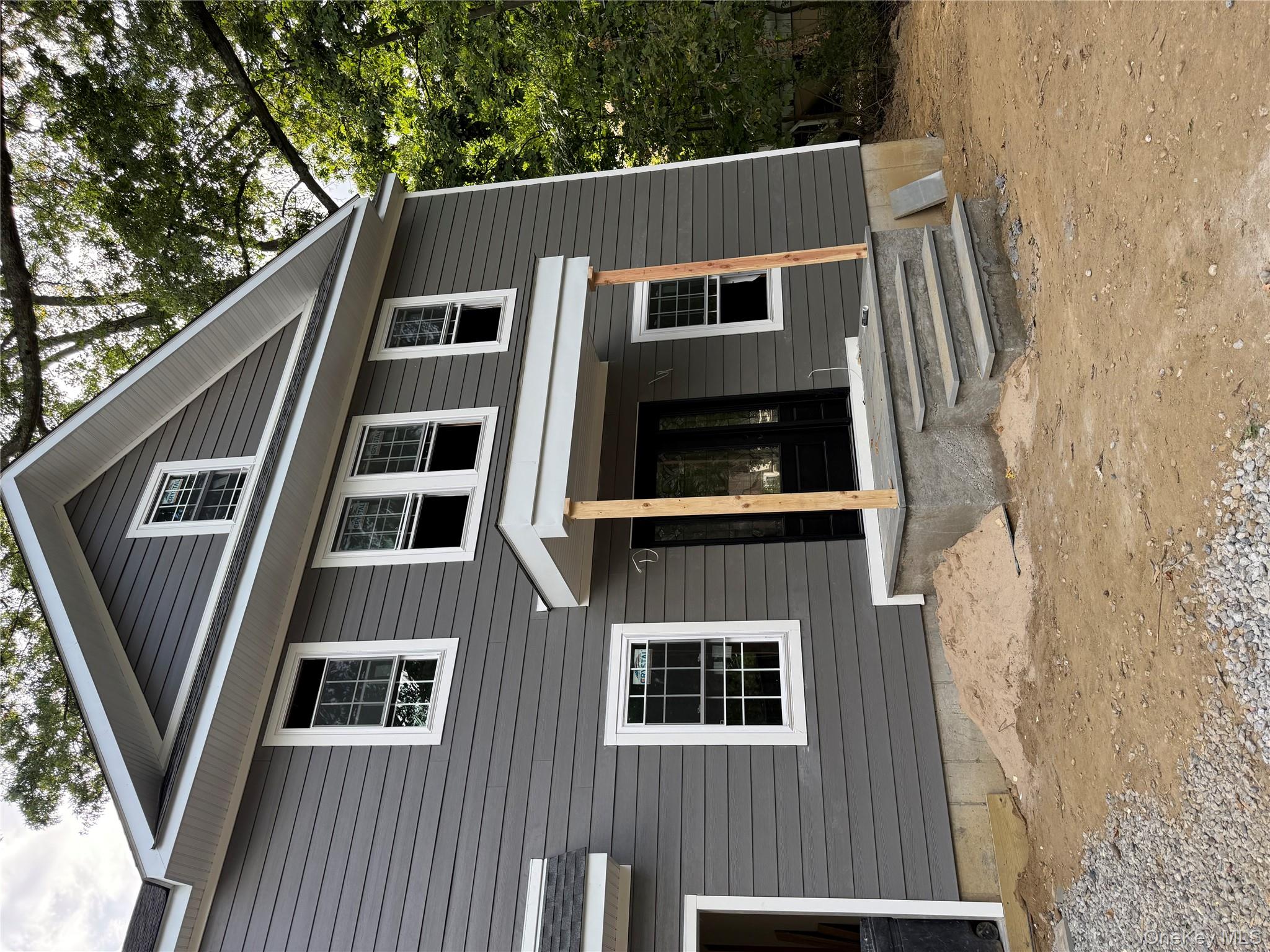10 Beaver Landing Harrison, NY 10528 - Photo 4 of 9 a view of a house with a yard