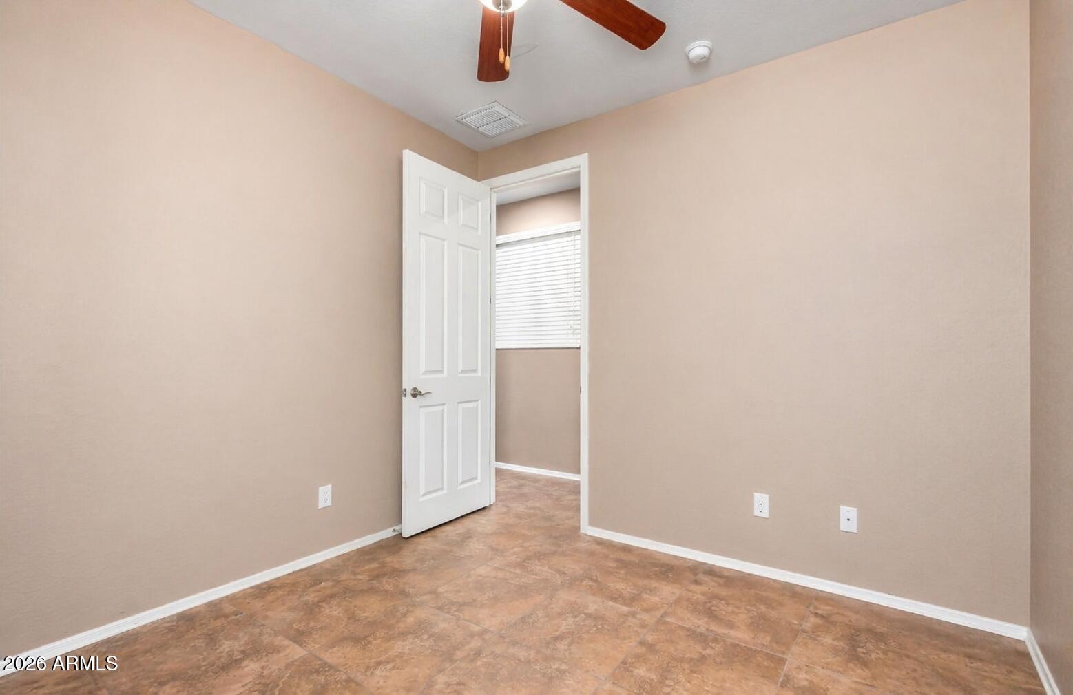16093 West Almeria Road Goodyear, AZ 85395 - Photo 29 of 38 Bedroom 3
