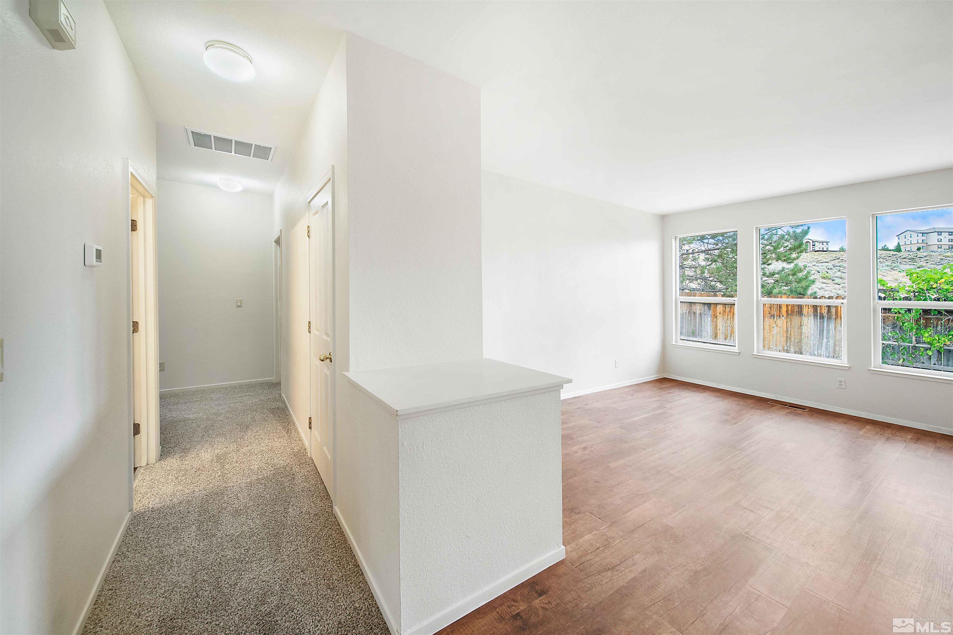 4015 Andrea Street Reno, NV 89503 - Photo 9 of 21 wooden floor in a room with a window