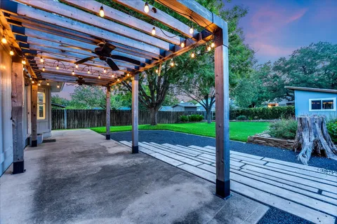a view of a backyard with a small yard