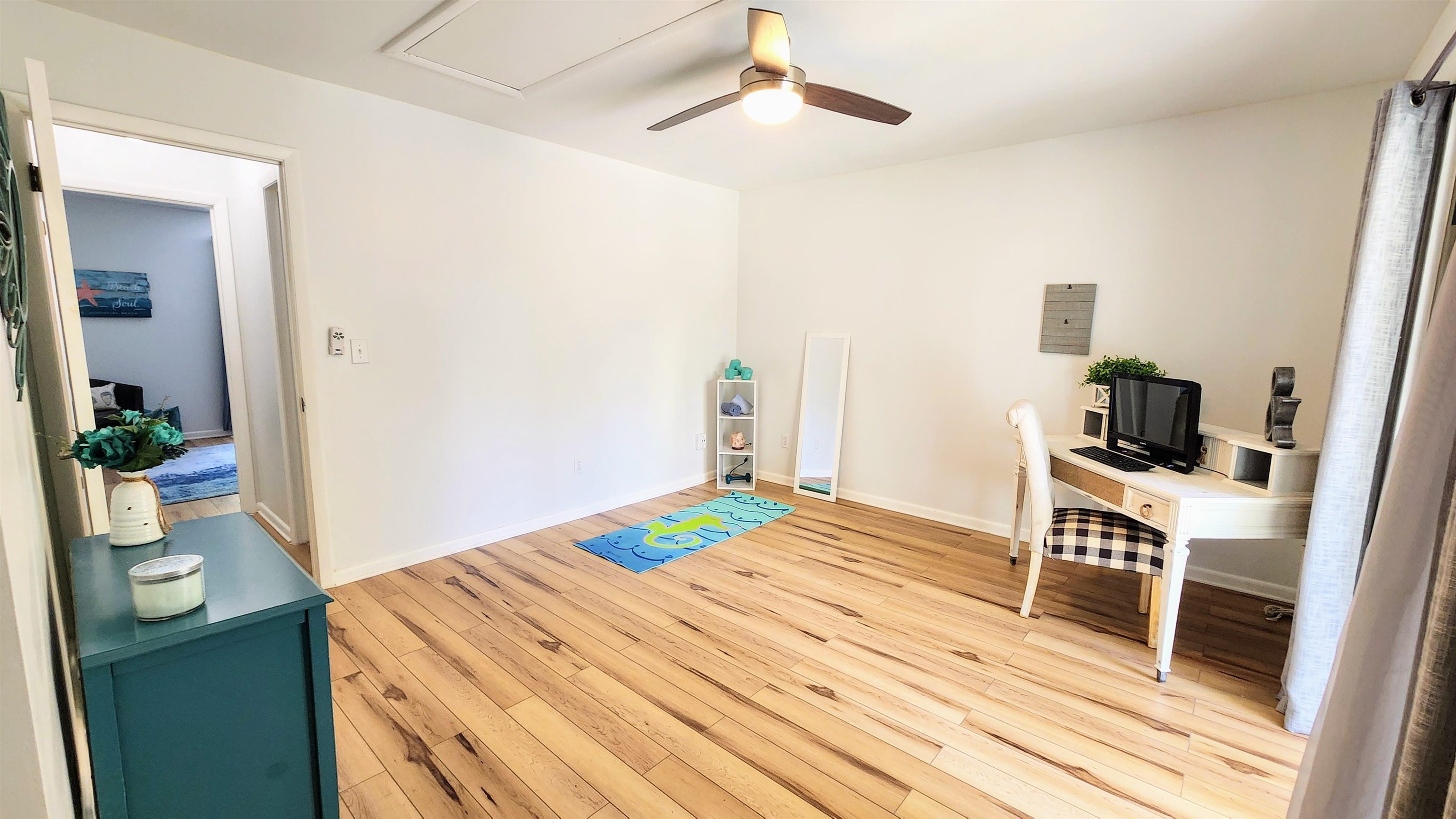 616 Bowers Lane St. Augustine, FL 32080 - Photo 13 of 18 a bedroom with a bed and a flat screen tv