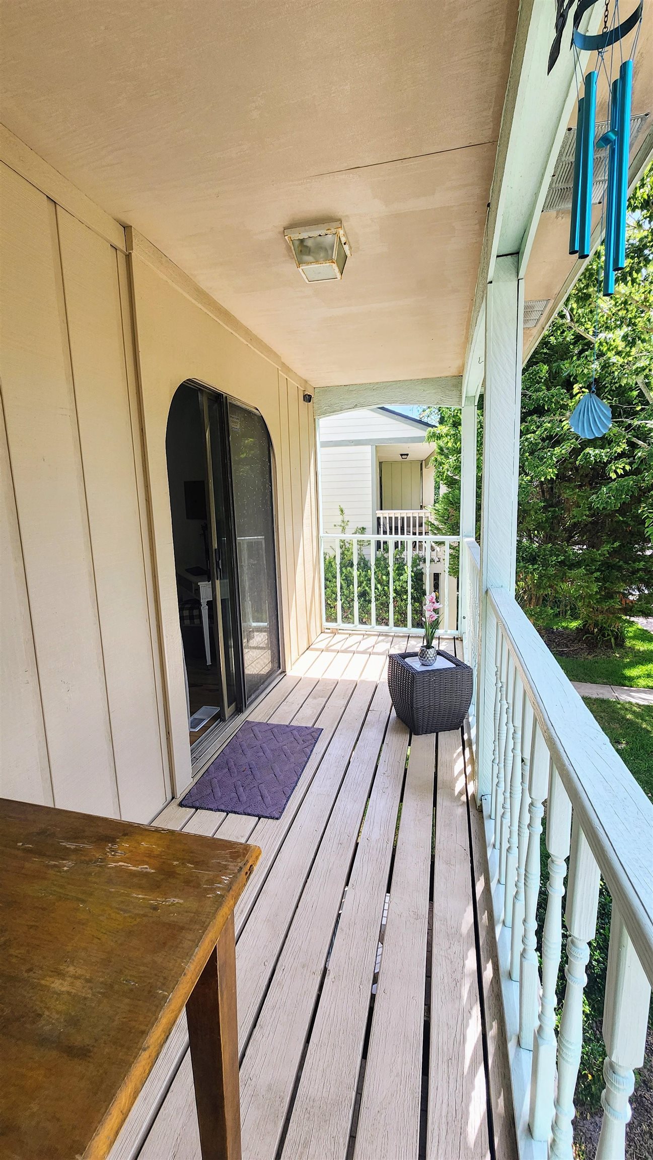 616 Bowers Lane St. Augustine, FL 32080 - Photo 15 of 18 a view of a balcony and wooden floor