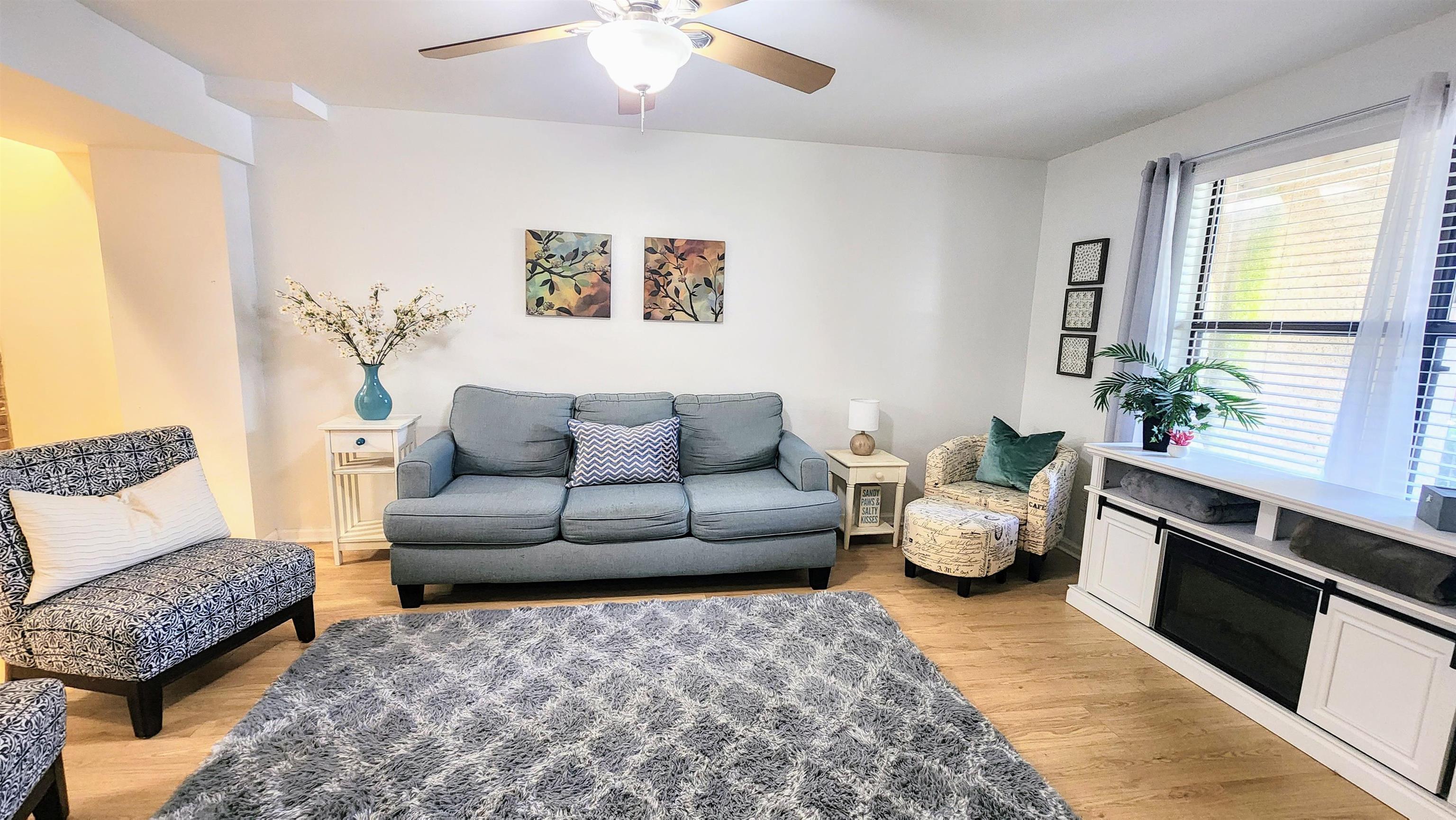 616 Bowers Lane St. Augustine, FL 32080 - Photo 3 of 18 a living room with furniture and a couch