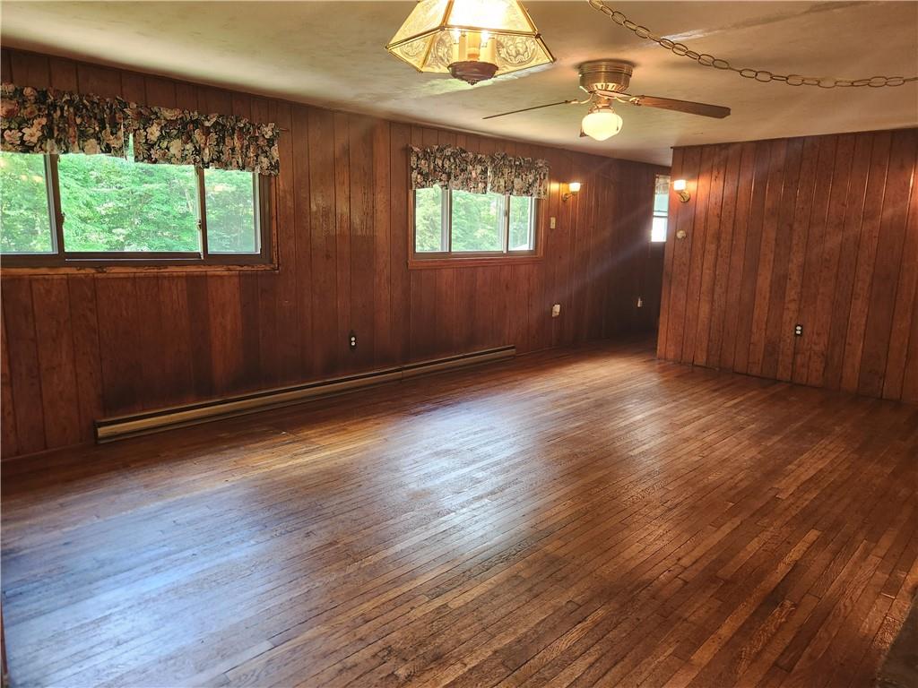 223 South Benbrook Road Butler, PA 16001 - Photo 8 of 31 Shiny hardwood floors throughout living, dining kitchen & hallway.