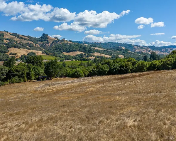a view of an outdoor space and mountain view