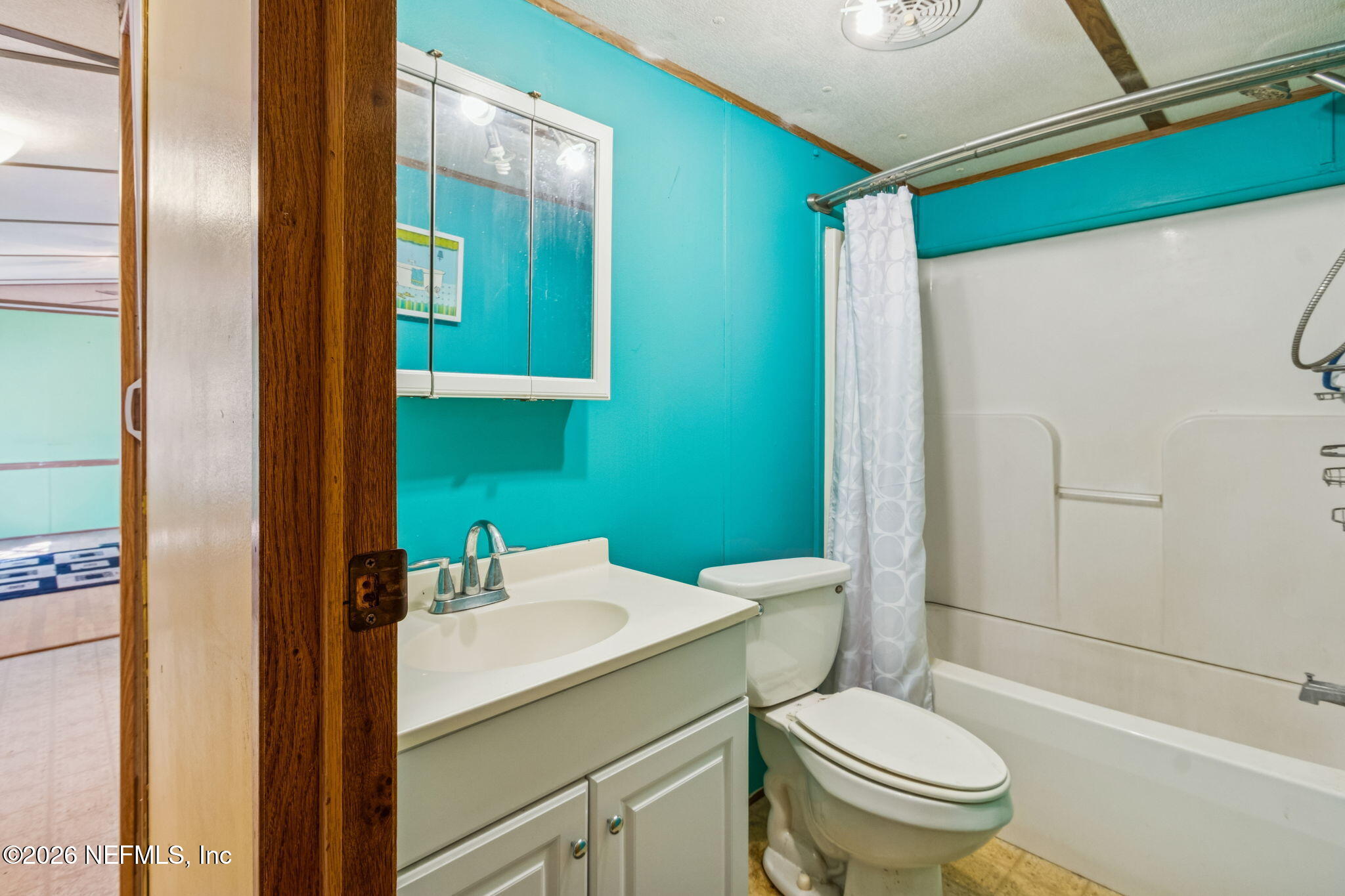 86341 Goodbread Road Yulee, FL 32097 - Photo 14 of 27 a bathroom with a sink toilet and shower