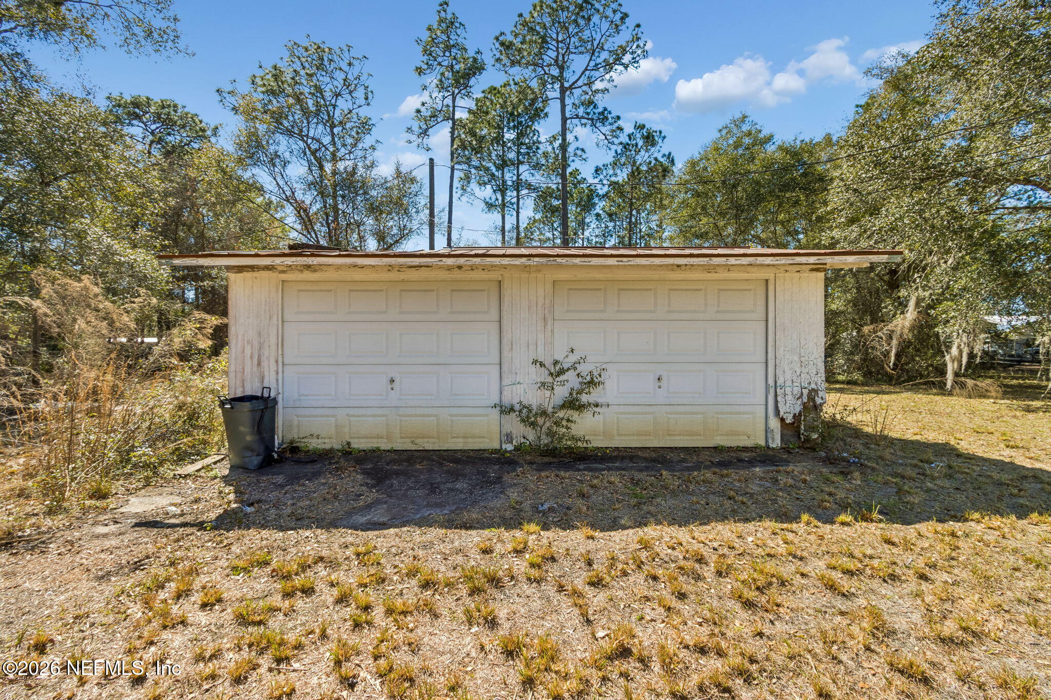 86341 Goodbread Road Yulee, FL 32097 - Photo 22 of 27 a view of a house with a yard