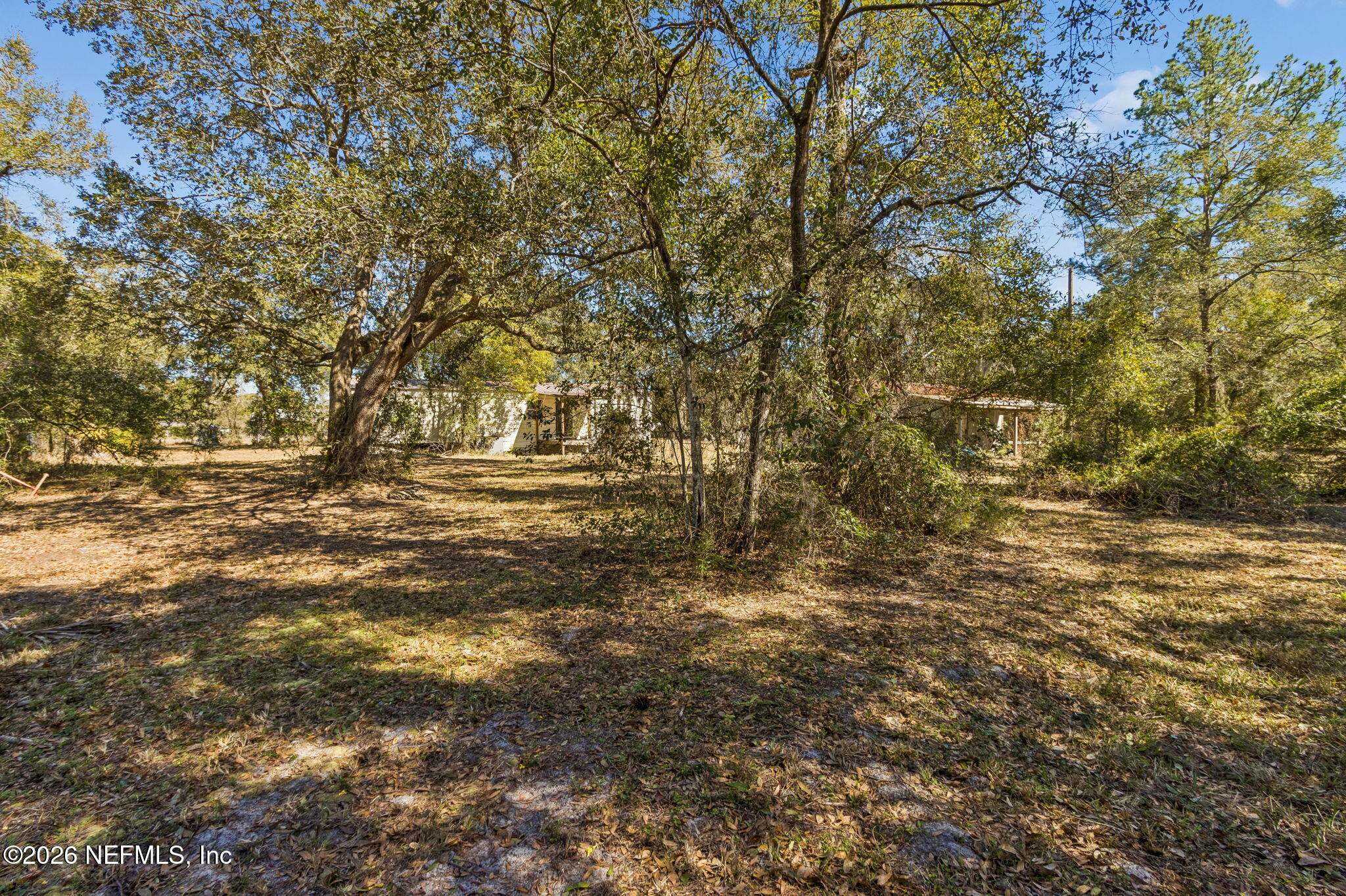 86341 Goodbread Road Yulee, FL 32097 - Photo 5 of 27 a view of outdoor space with a yard