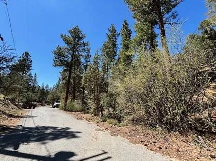 a view of a backyard of the house