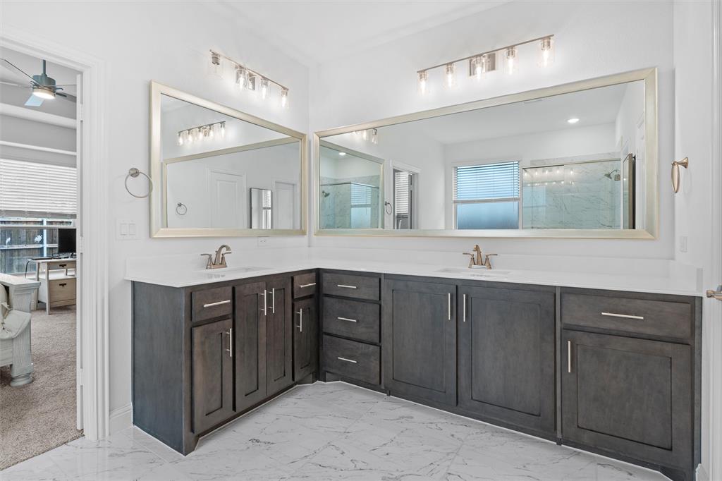 753 Truchas Avenue Forney, TX 75126 - Photo 15 of 29 a bathroom with a double vanity sink mirror and