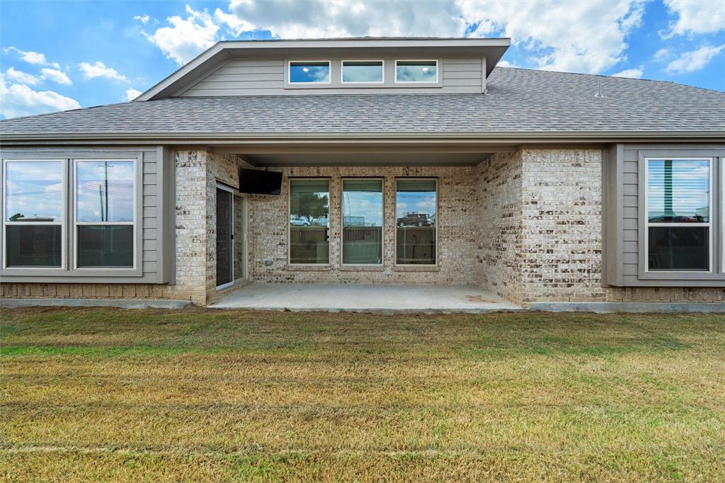 753 Truchas Avenue Forney, TX 75126 - Photo 28 of 29 a view of a building with a large window