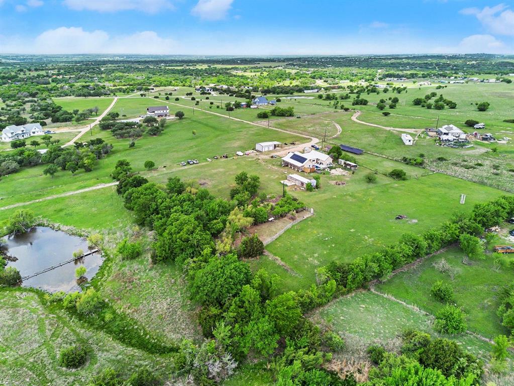 6694 Hutcheson Hill Road Springtown, TX 76082 - Photo 36 of 37 a view of a city with a lake